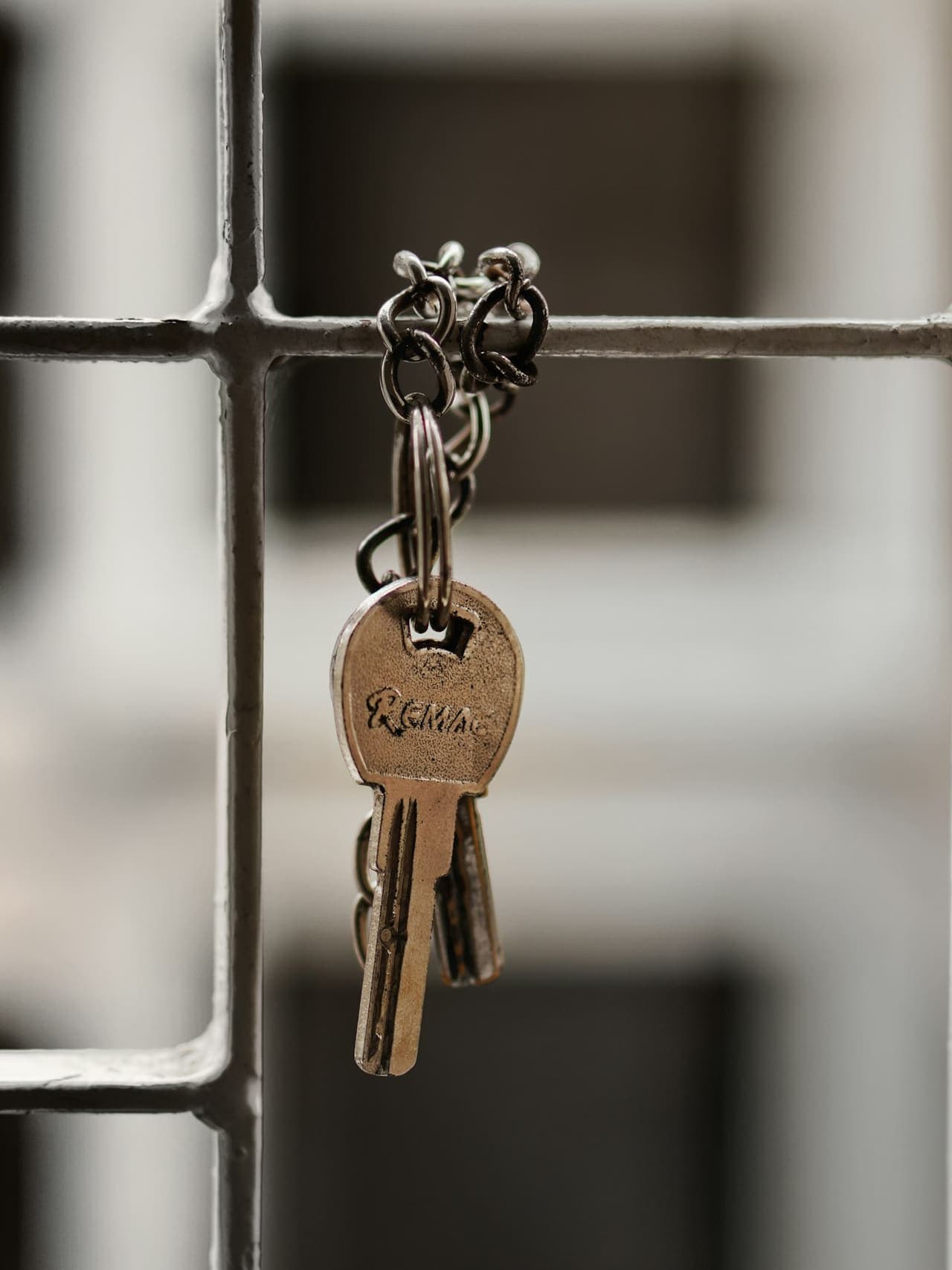 A set of keys hanging from a lock after a fresh rekey service